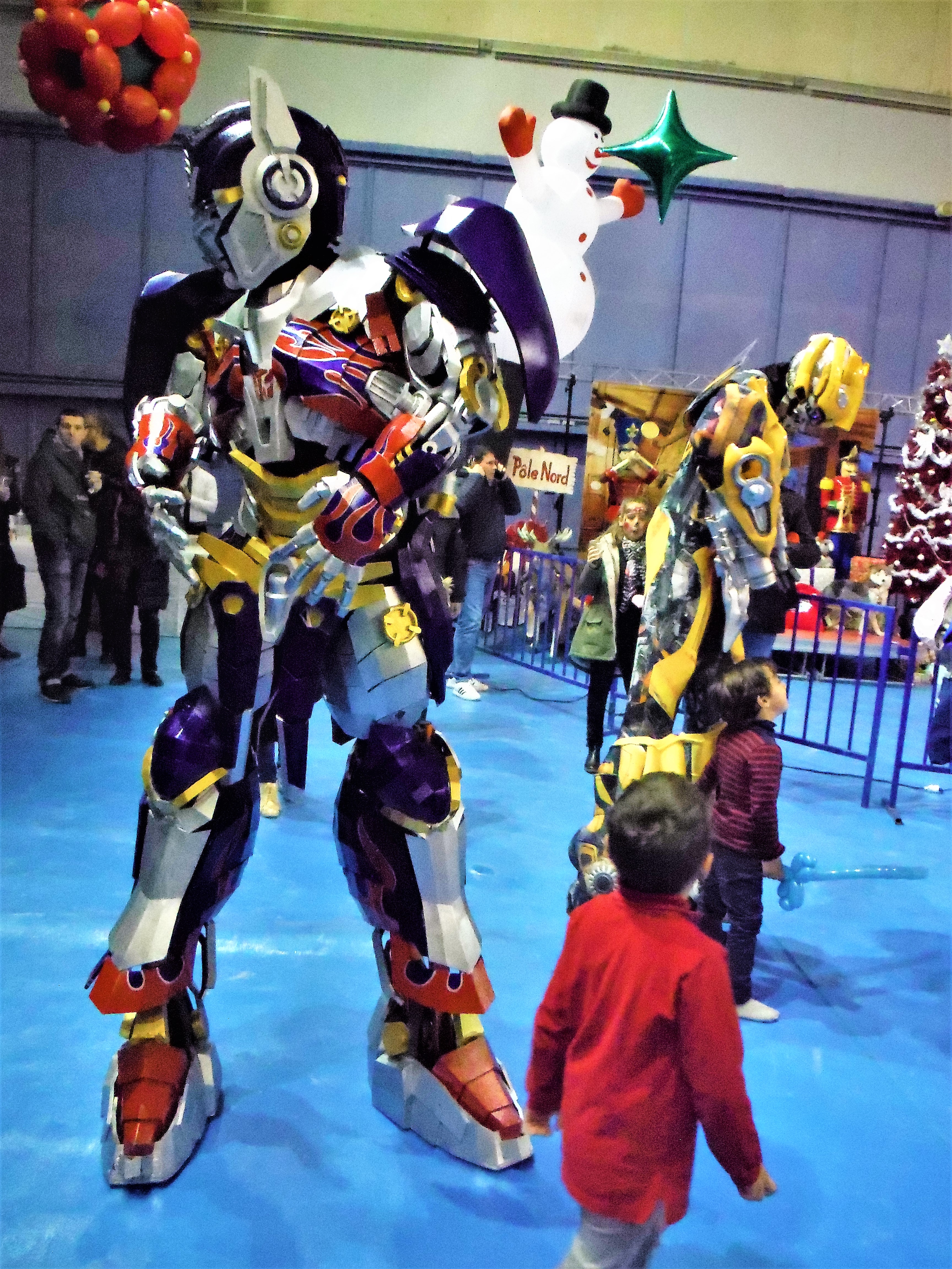 alt "TRANSFORMER ET IRON MAN EN DÉAMBULATION"